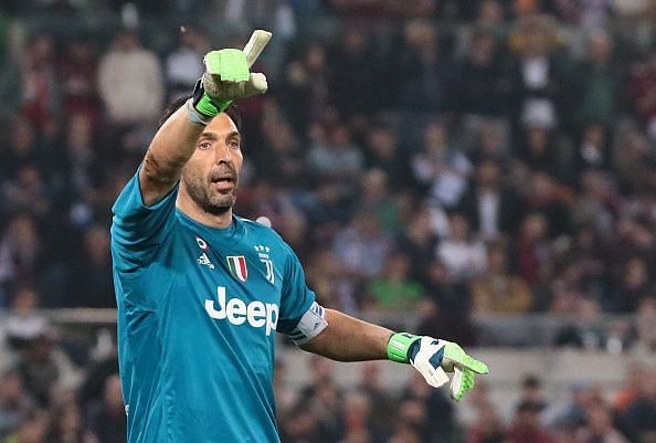 Juventus' Italian goalkeeper Gianluigi Buffon gestures...